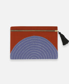 Anchal Project organic cotton canvas pouch with rust orange eclipse pattern