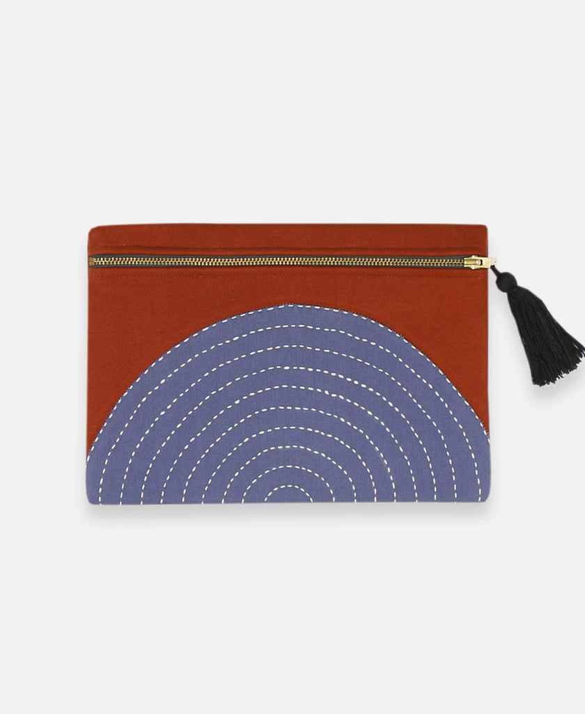 Anchal Project organic cotton canvas pouch with rust orange eclipse pattern