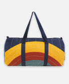 Anchal Project organic cotton travel duffle bag with rainbow eclipse pattern