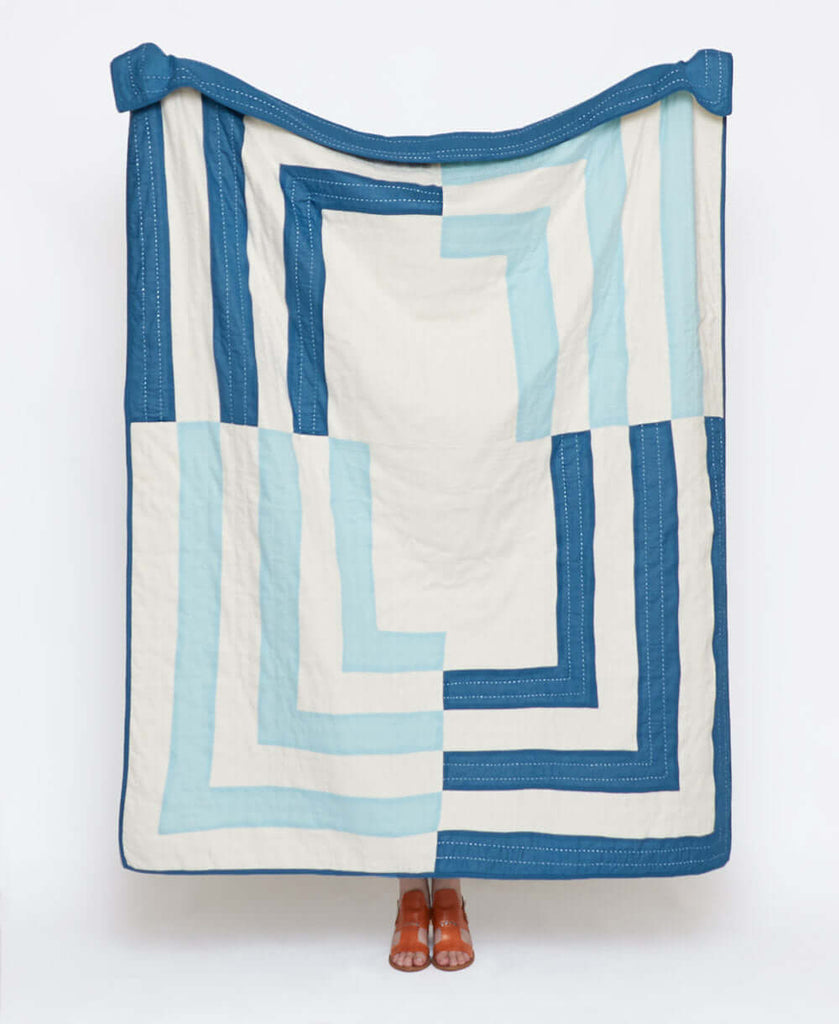 cobalt blue and sky blue geometric modern quilt with hand-embroidered kantha stitching made in India