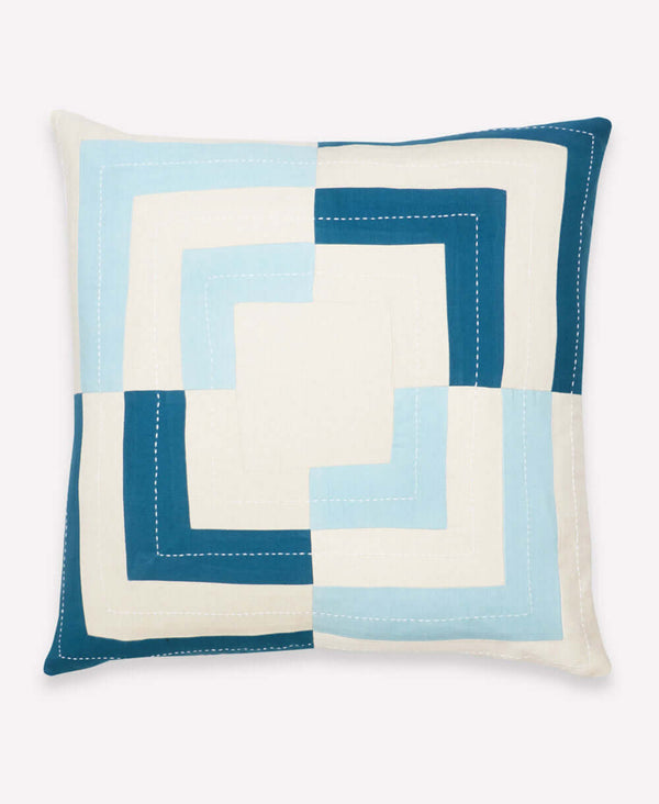 White organic cotton modern throw pillow with light blue and teal square design