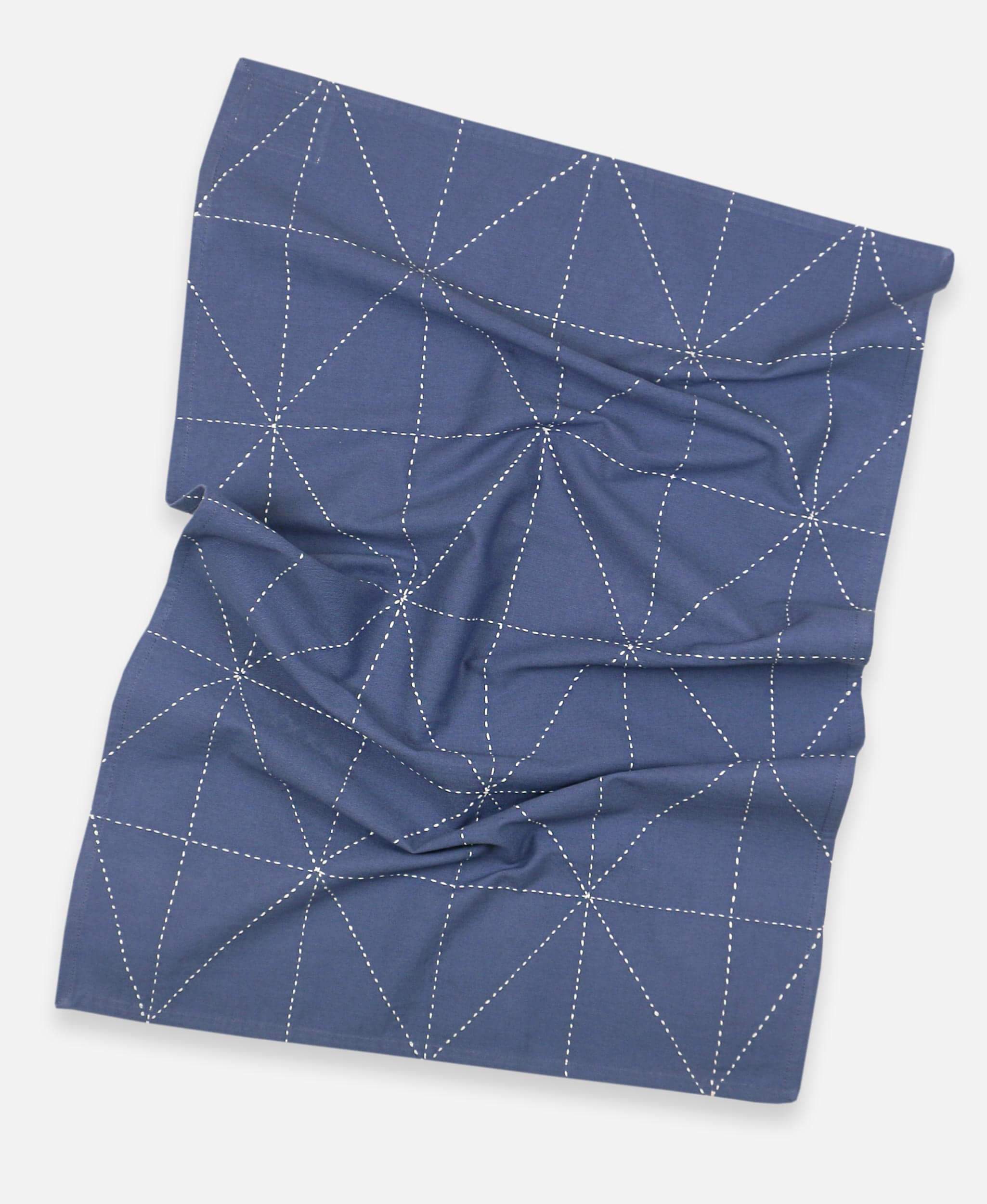 Anchal Project organic cotton geometric tea towel with hand-stitched graph design