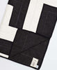 black and ivory interlock quilt with bold geometric design handmade in India by Anchal artisans