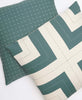 spruce green pillow pairing featuring cross-stitch throw pillow and interlock throw pillow by Anchal Project