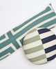 spruce green interlock long lumbar pillow paired with round offset throw pillow by Anchal Project