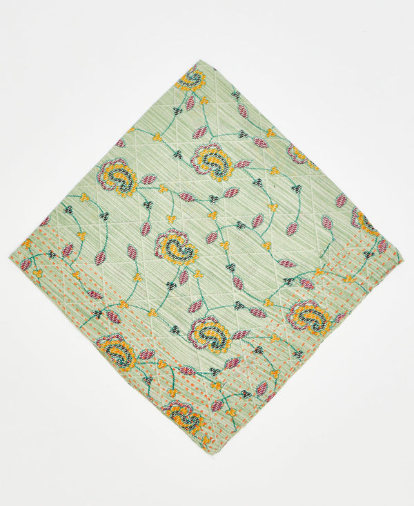 pale green bandana with light grid pattern and red and yellow paisleys and vines with orange traditional kantha stitching 