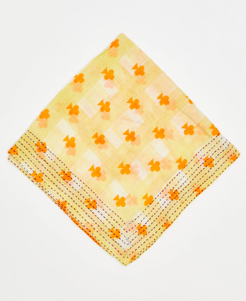 yellow gingham bandana with orange clovers and red kantha stitching 