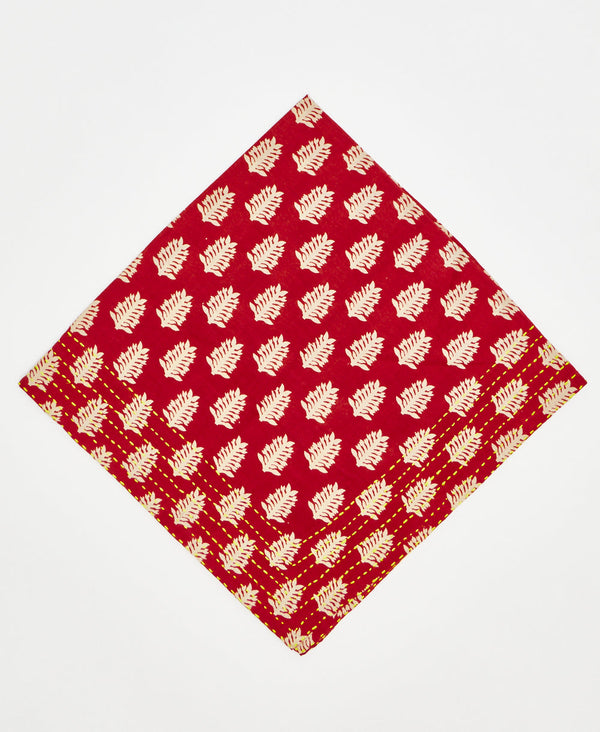 red cotton bandana with white plants and yellow kantha stitching 
