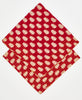 red and white bandanas with yellow kantha stitching along their edges