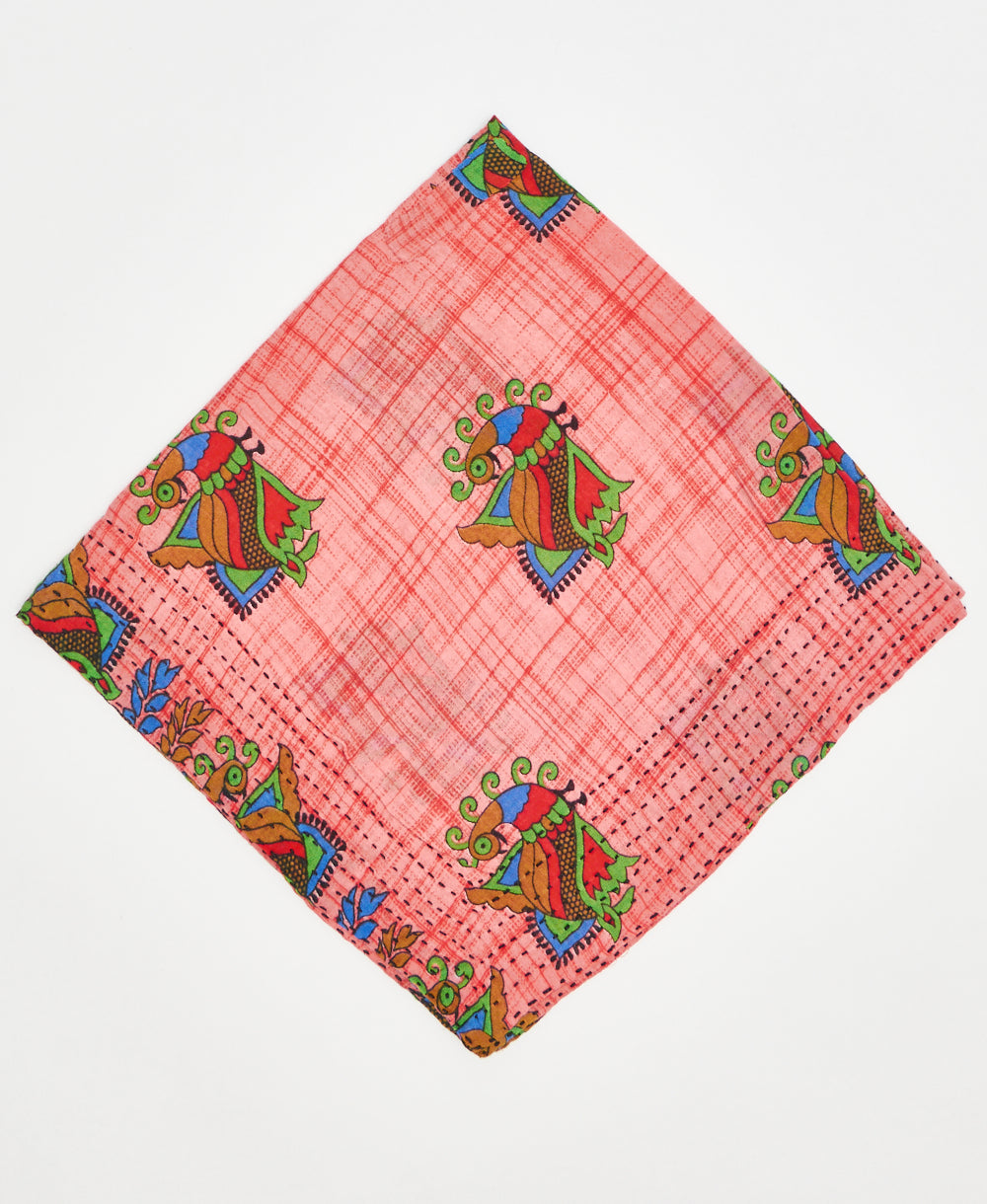 coral bandana with bright multi-colored peacocks 