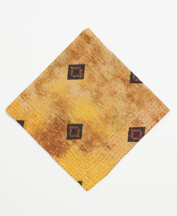 beige and yellow cotton bandana with red and black diamonds and red traditional kantha stitching