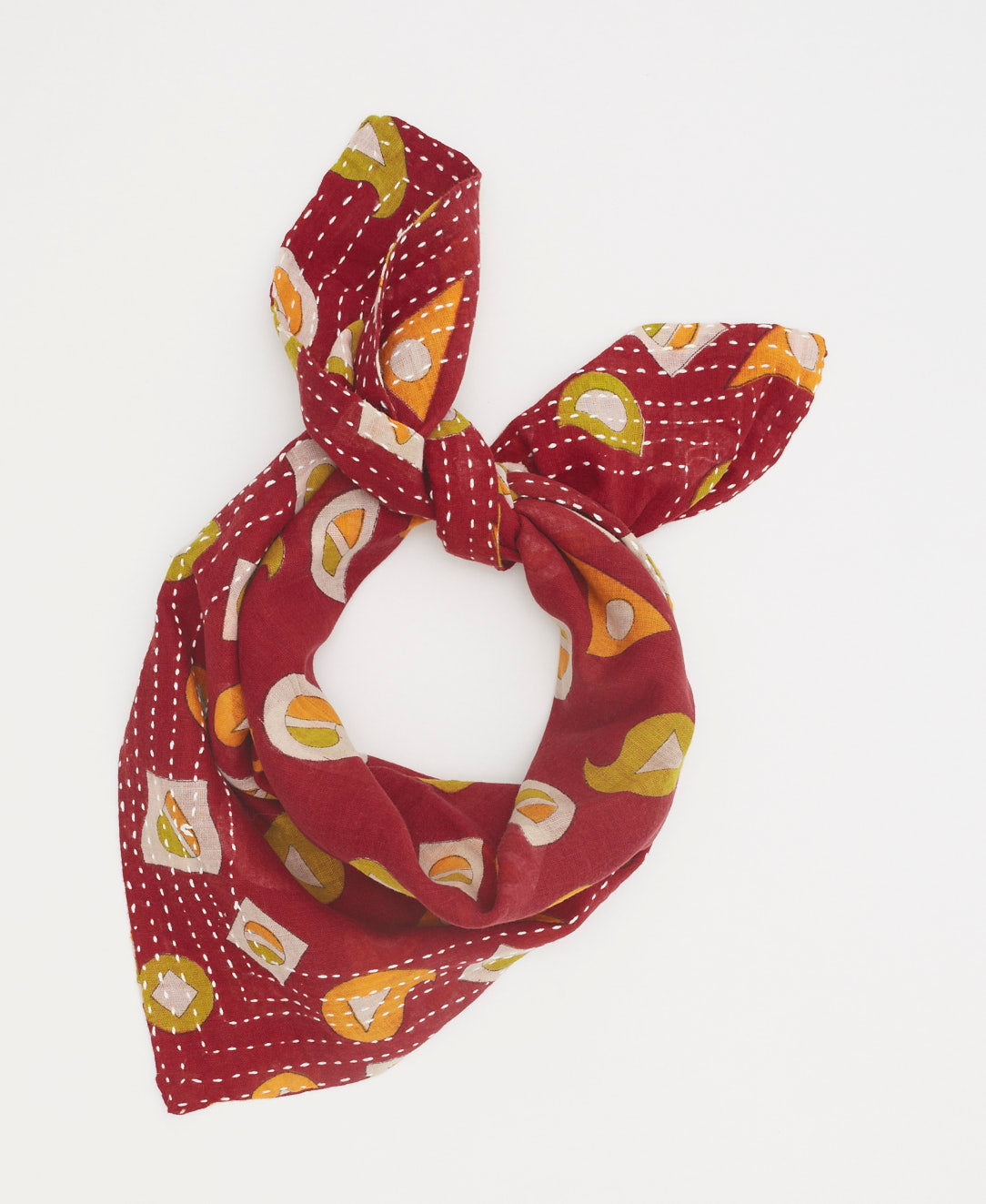 Burgundy sustainably created bandana featuring a yellow and green pattern 