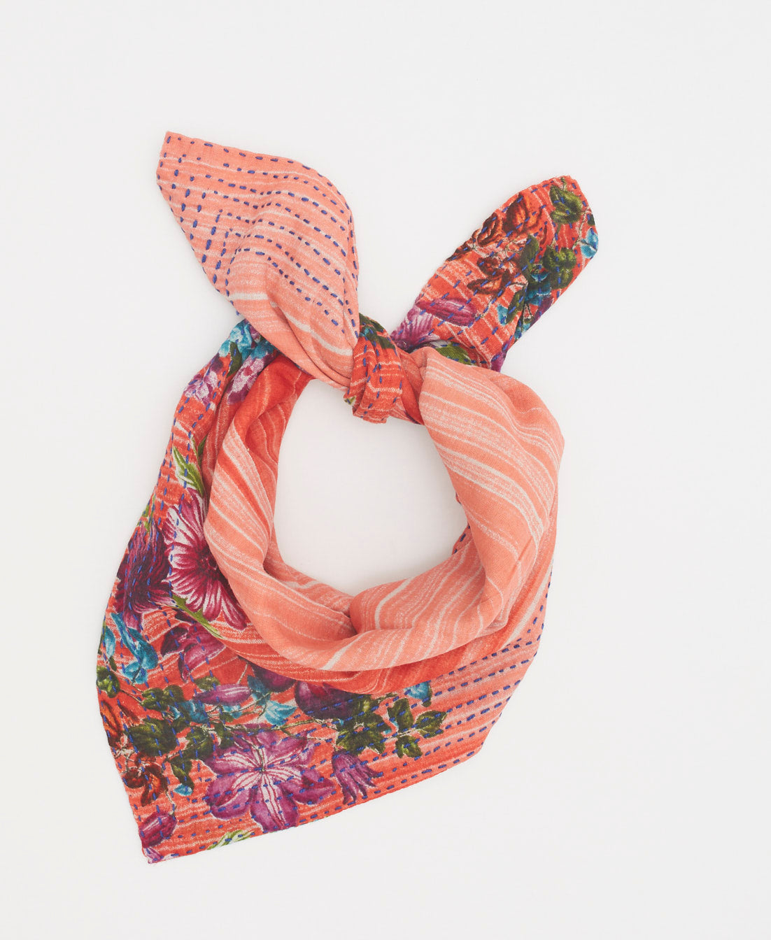 Artisan made bandana featuring a floral print and blue traditional stitching 