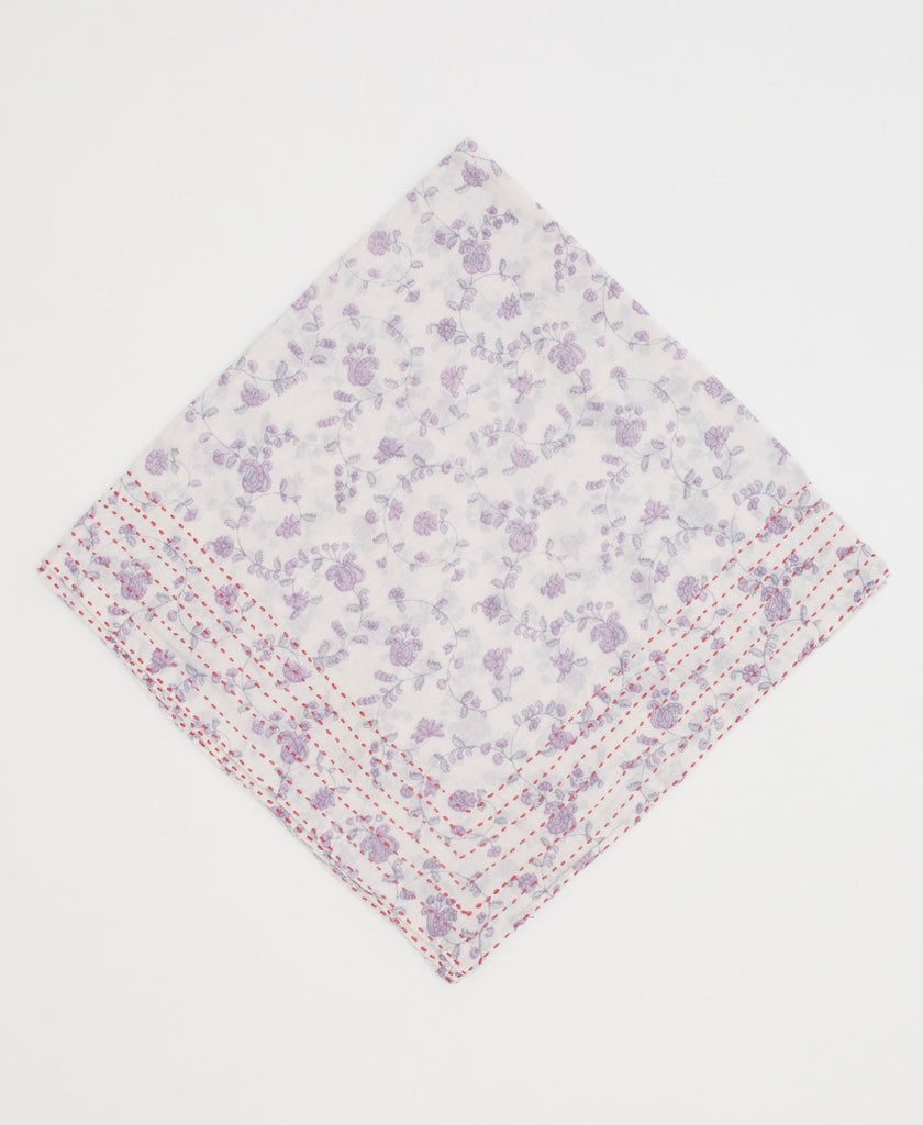 white cotton bandana with purple swirling floral details and red traditional kantha stitching 
