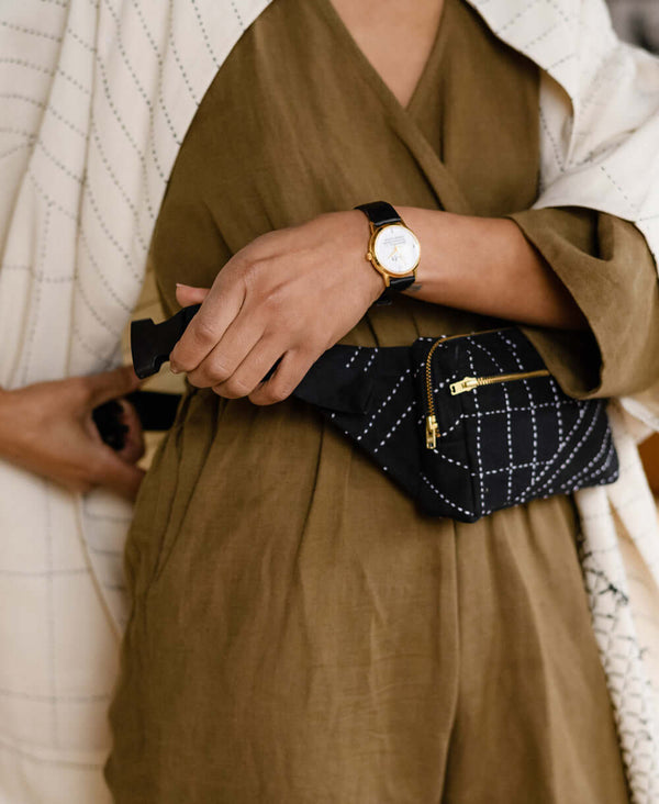 crossbody belt bag with grid-stitched pattern handcrafted in India by Anchal artisans