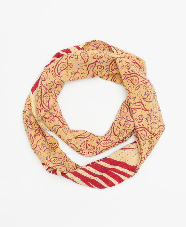 hand-stitched infinity scarf made of upcycled cotton saris by a woman in Ajmer, India