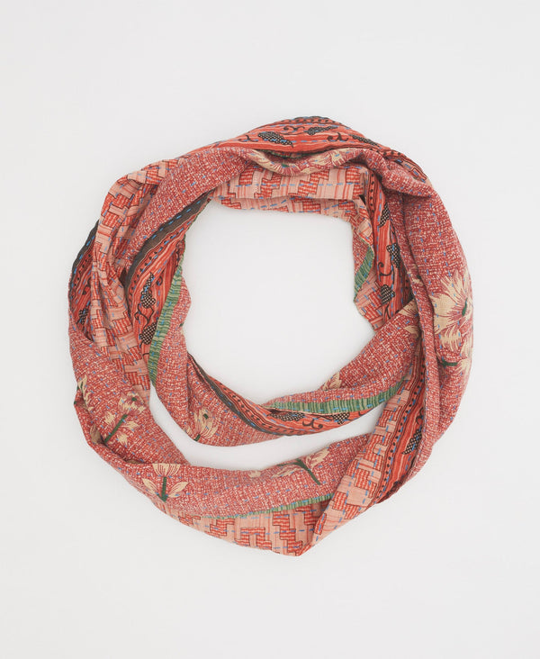 Orange and green cotton scarf handstitched by women artisans in Ajmer, India