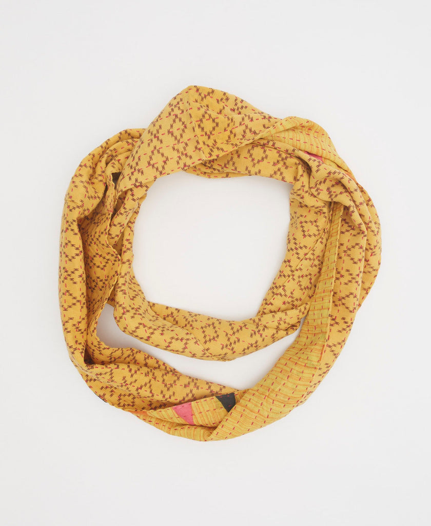 Bright yellow cotton infinity scarf with traditional patterns