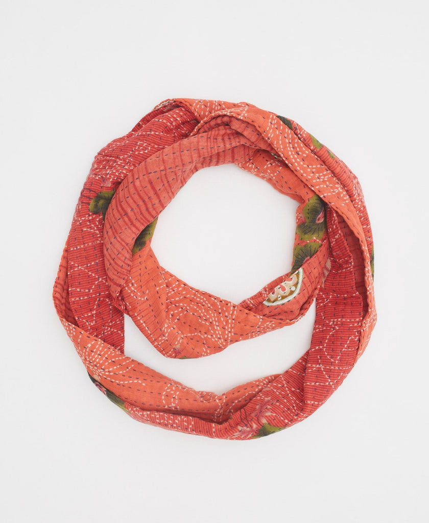 coral cotton infinity scarf with green floral details and traditional kantha stitching