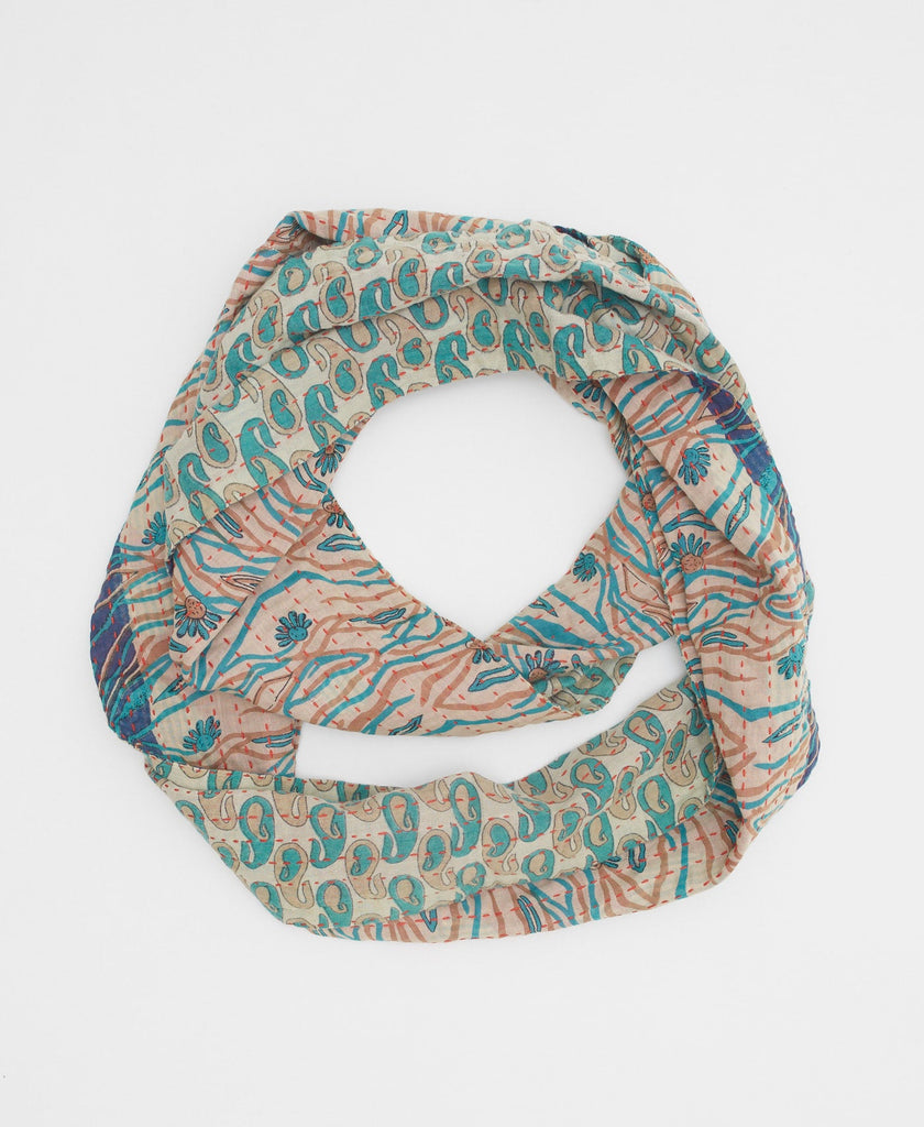 beige soft cotton infinity scarf with teal and orange flowers, stripes, and paisleys