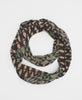 black, brown, and beige cotton infinity scarf with geometric and paisley pattern details 