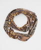 brown and yellow cotton infinity scarf with floral pattern details 