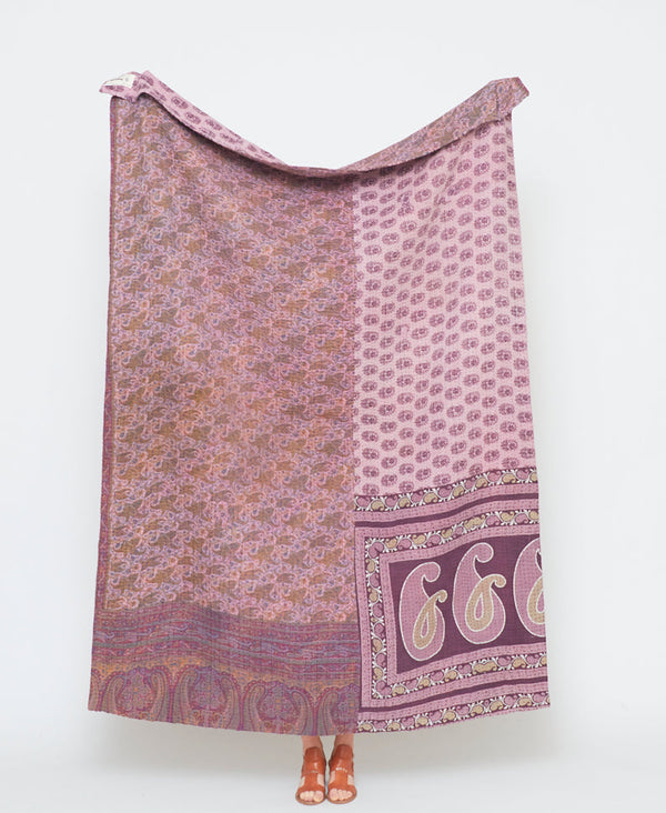 mauve purple kantha quilt with oversized paisley patterns throughout