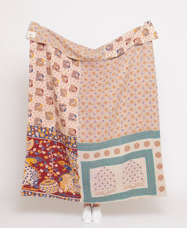 Handmade large throw quilt created using upcycled vintage saris 
