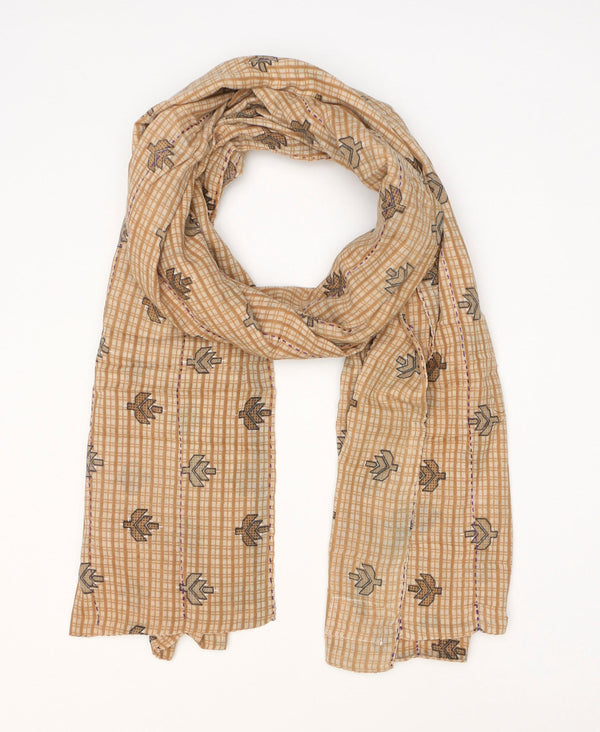 Lightweight cotton scarf that is two different recycled fabrics stitched together 