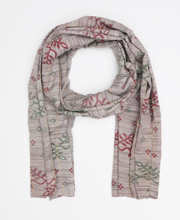 Light grey cotton traditional cotton scarf that has green and red detailing 