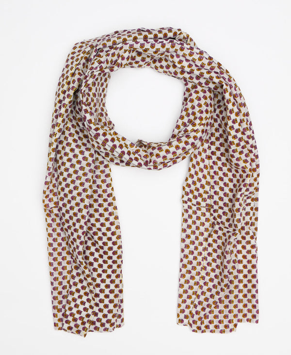 Long white cotton scarf made from recycled saris that were collected in India 