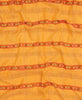 Artisan made orange and red print scarf featuring purple traditional kantha stitching  