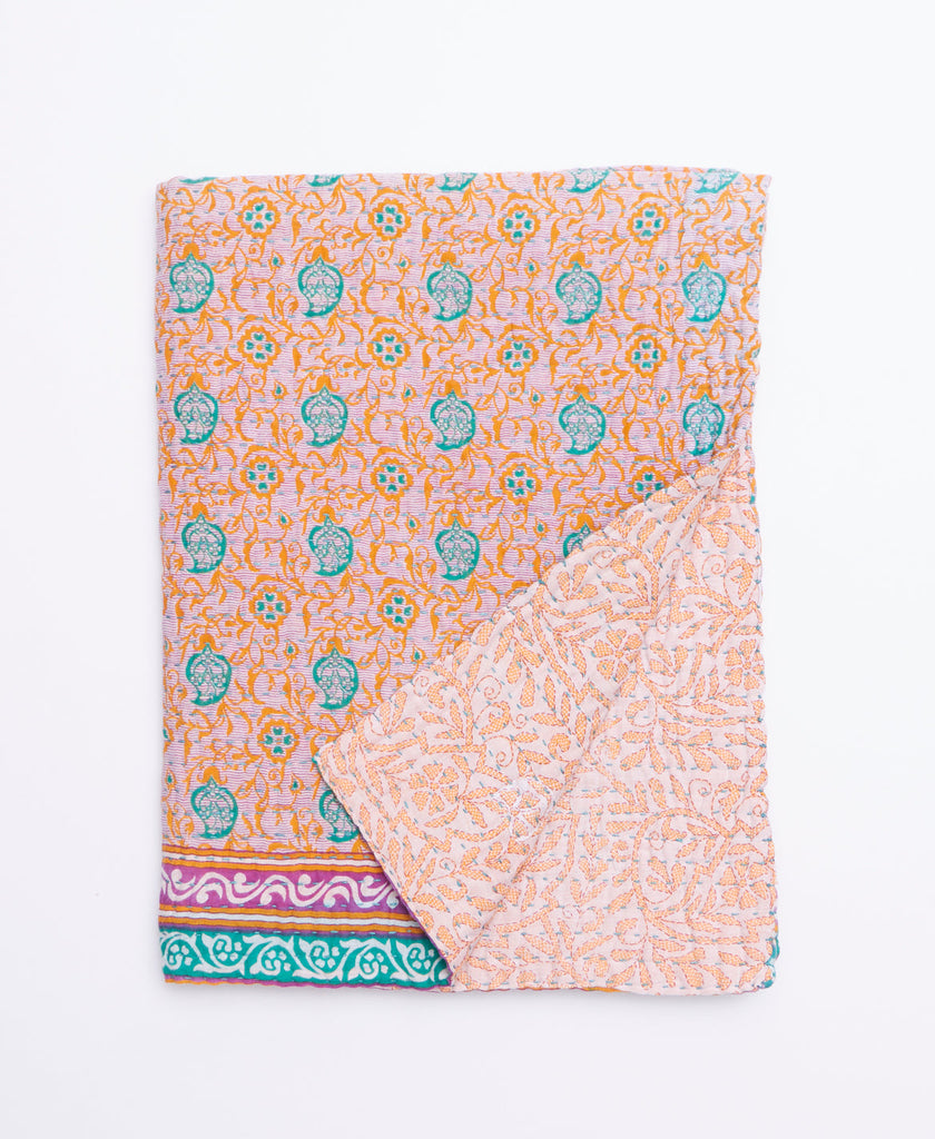 Handmade small quilt throw created using upcycled vintage saris 