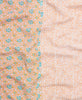 Paisley and teal contrasting print quilt featuring kantha stitching 