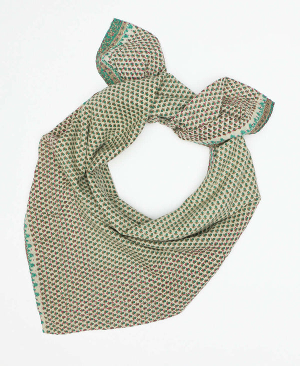 Light green colored minimal patterned scarf that is sustainable and fashionable 