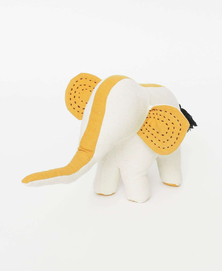 Small bone colored elephant with mustard details and black Kantha stitching 