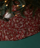 red floral kantha tree skirt made from upcycled vintage cotton saris in India by Anchal artisans