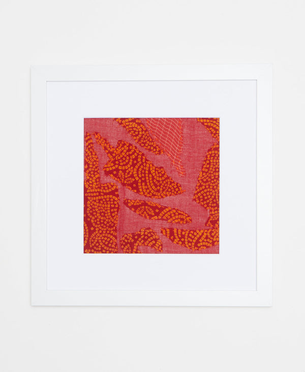 Handcrafted artisan-made textile art featuring a bold abstract orange, red, and pink design