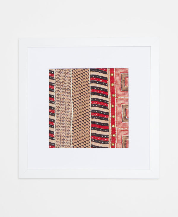 Handcrafted artisan-made framed textile art featuring a contrasting stripe pattern in a beige, black, and red color palette