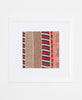 Handcrafted artisan-made framed textile art featuring a contrasting stripe pattern in a beige, black, and red color palette