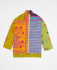 Bold and colorful abstract print artisan-made jacket created with upcycled vintage saris 