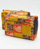 Unique yellow and orange checkered toiletry bag that was hand stitched by artisans earning a fair wage 