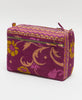 Plum purple fabric with funky greens and peach colored patterns on recycled vintage sarees to create a sustainable, one-of-a-kind toiletry bag