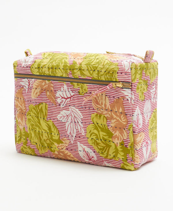 ecofriendly red striped large cotton toiletry bag with white and beige leaves and bright green flowers