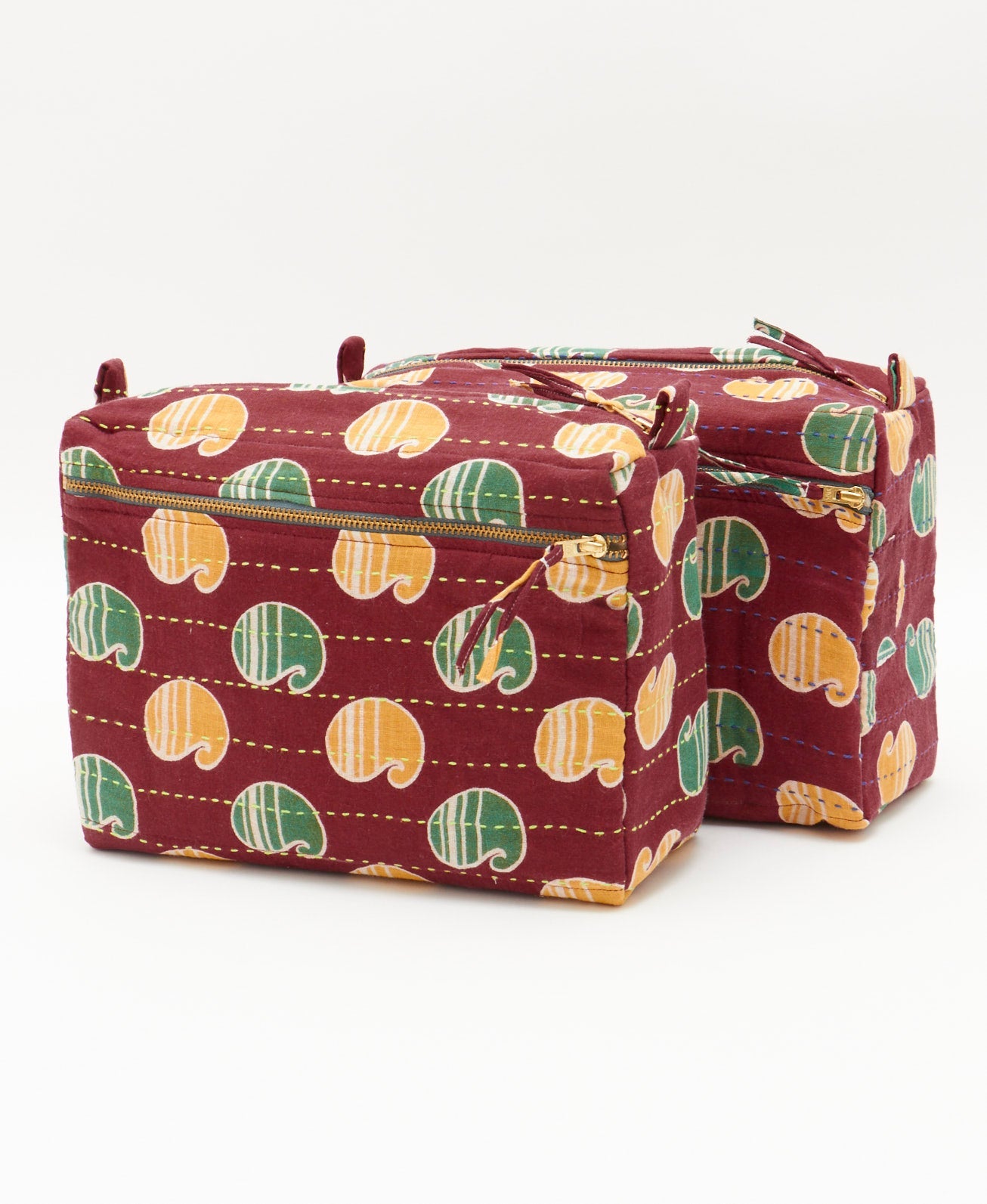 brick red vintage kantha toiletry bags featuring different thread colors 