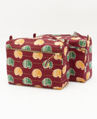 brick red vintage kantha toiletry bags featuring different thread colors 