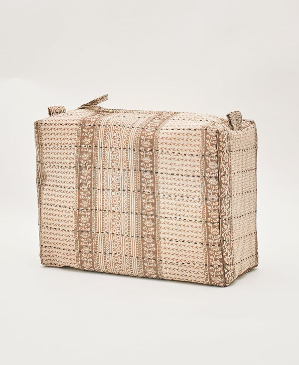Tan and white sustainable toiletry bag created using upcycled vintage saris 