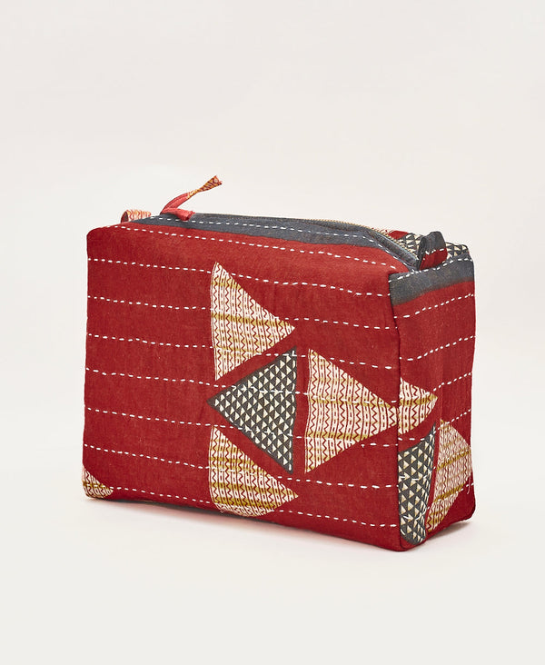 Eco-friendly triangle print artisan made make up bag crafted using upcycled materials 