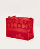 Bright red eco-friendly artisan-made make up bag featuring a front zippered pocket 