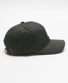 green baseball hat with 6 panel design, bronze tone buckle and low-profile bill